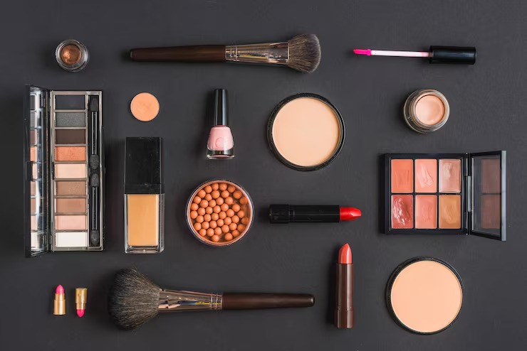 High angle view of makeup products flat lay